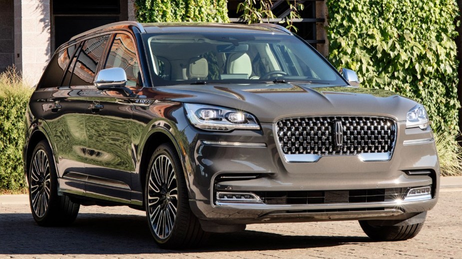 Lincoln Aviator posed with a garden background