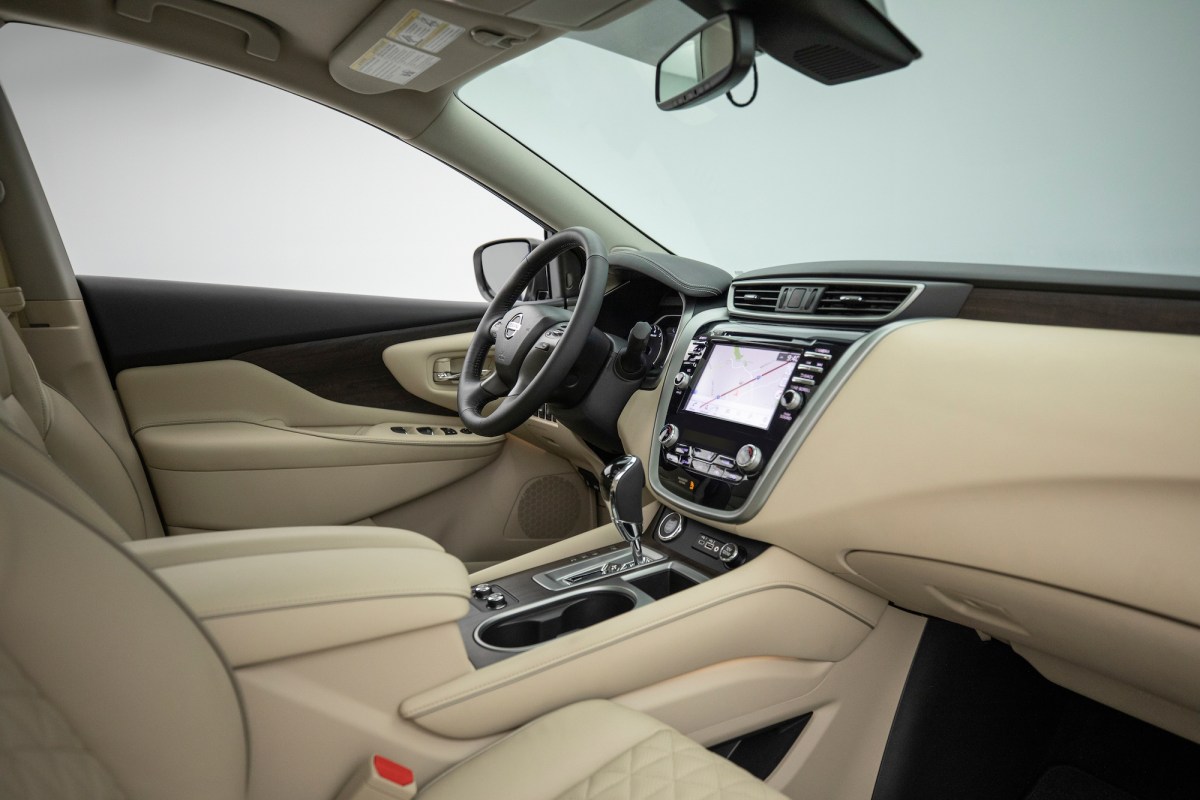 Shown is the Nissan Murano interior with cream leather and various tech features