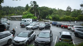 A parking lot with cars, where a potential parking lot accident could have occurred.