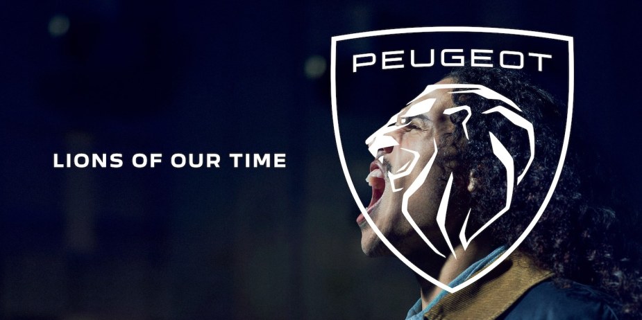 The Peugeot lion logo is superimposed over the face of a roaring sports fan in this Stellantis advertisement.