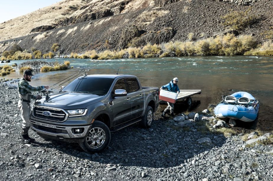 A 2023 Ford Ranger shows off its capability at a lake.