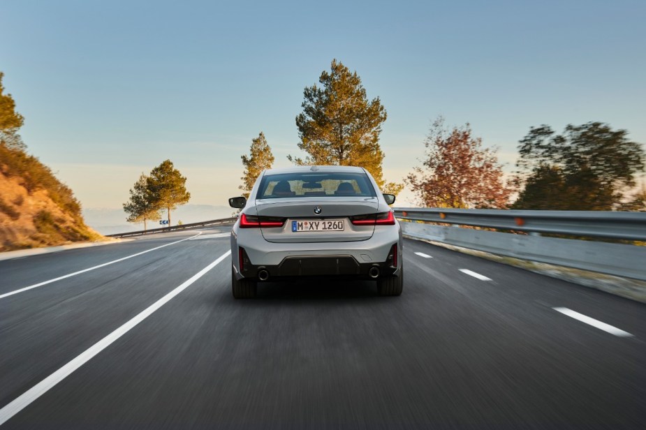 Rear view of new gray 2023 BMW 3 Series, highlighting how much a fully loaded version costs