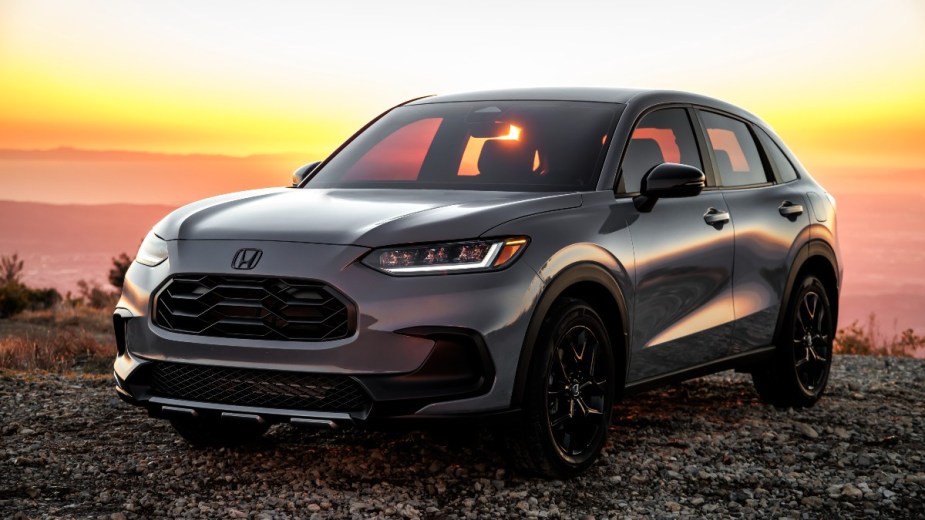Gray 2023 Honda HR-V crossover SUV with sunset in the background
