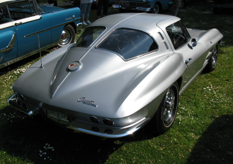 Silver Split-Window Corvette in the grass