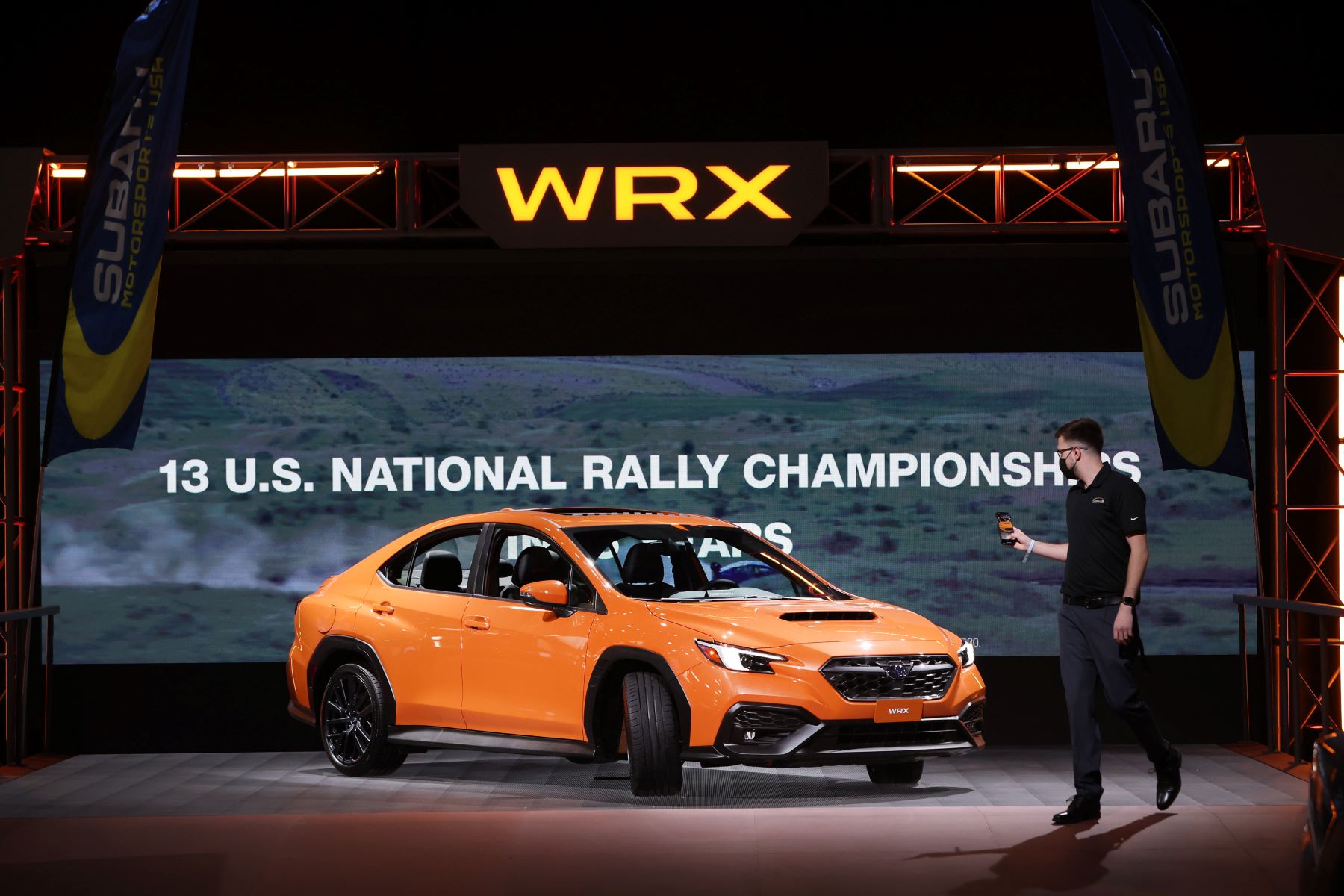 An orange Subaru WRX at the McCormick Place convention center during the Chicago Auto Show