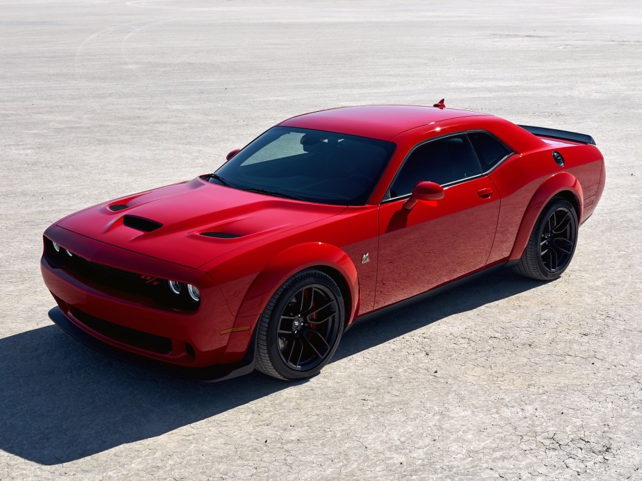 A red 2021 Dodge Challenger R/T Scat Pack Widebody in the desert