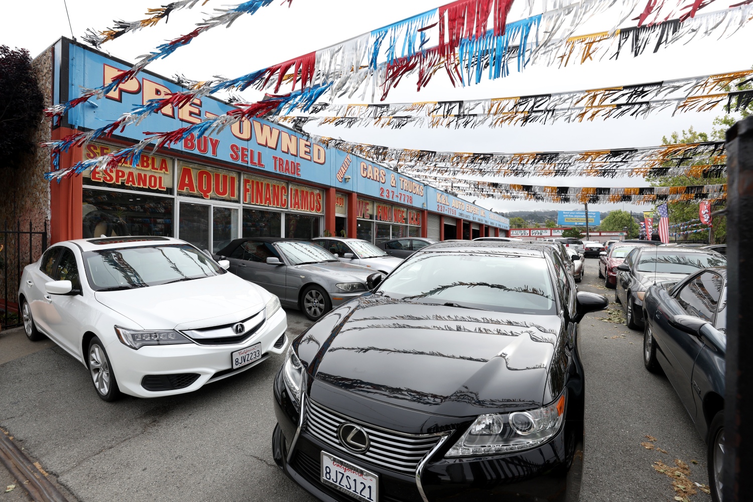 Buying a used car like these options at a dealership