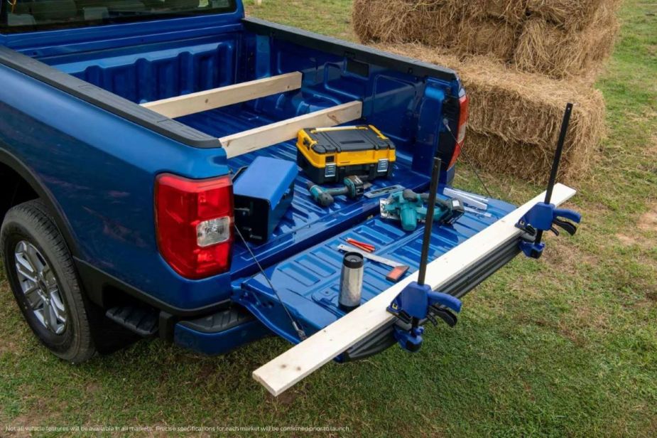 Tools in the pickup bed of a blue 2023 Ford Ranger midsize pickup truck