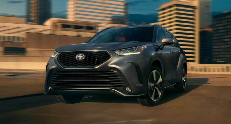 A gray 2022 Toyota Highlander is parked outdoors. 