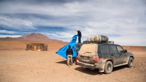 A Toyota Land Cruiser FJ80 shows its capability off as an SUV.