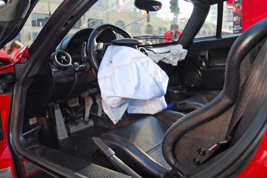 The deployed airbag inside the remains of a Enzo Ferrari previously wrecked by actor Eddie Griffin.