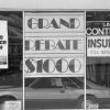 Car finance and lease signs at a Lincoln Continental showroom in 1980