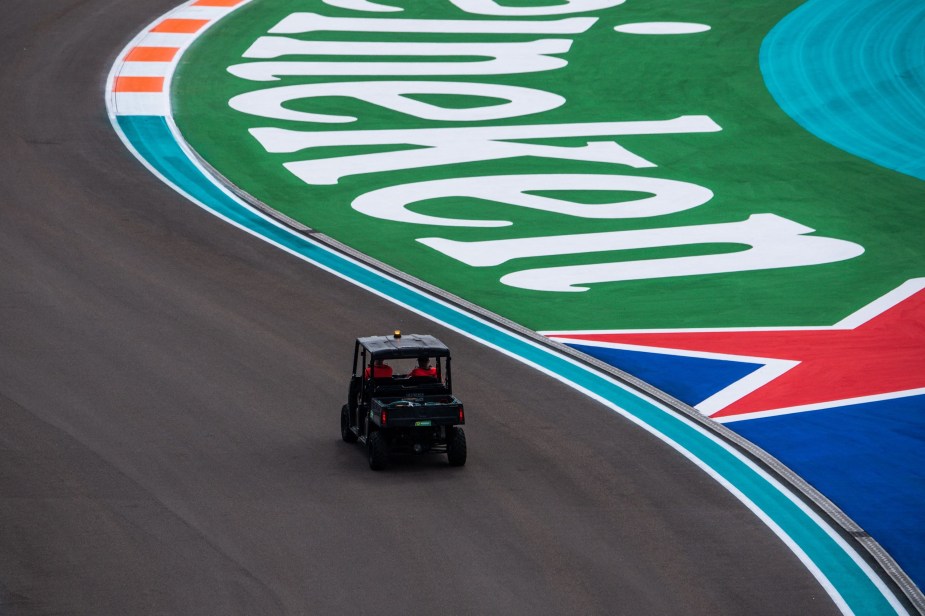 A golf cart runs on the Formula One track ahead of the Miami Grand Prix