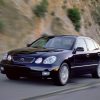 A front view of the 2002 Lexus GS driving on a canyon road.