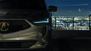 A 2022 Acura MDX midsize luxury SUV facing forward