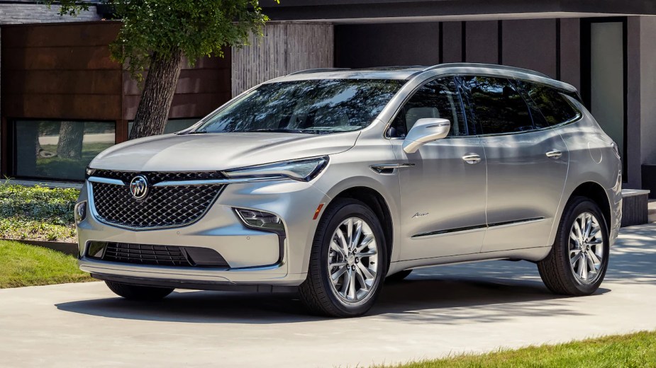 A silver 2022 Buick Enclave midsize luxury SUV. Why aren't more people buying one of Consumer Reports higher rated models?