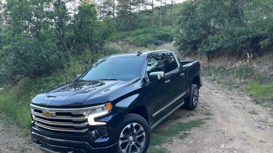 A front view of the 2022 Silverado driving down a hill.
