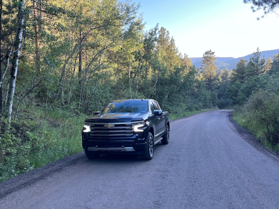 A view of the 2022 Chevy Silverado driving off road.