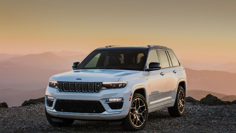 White 2022 Jeep Cherokee with sunset background