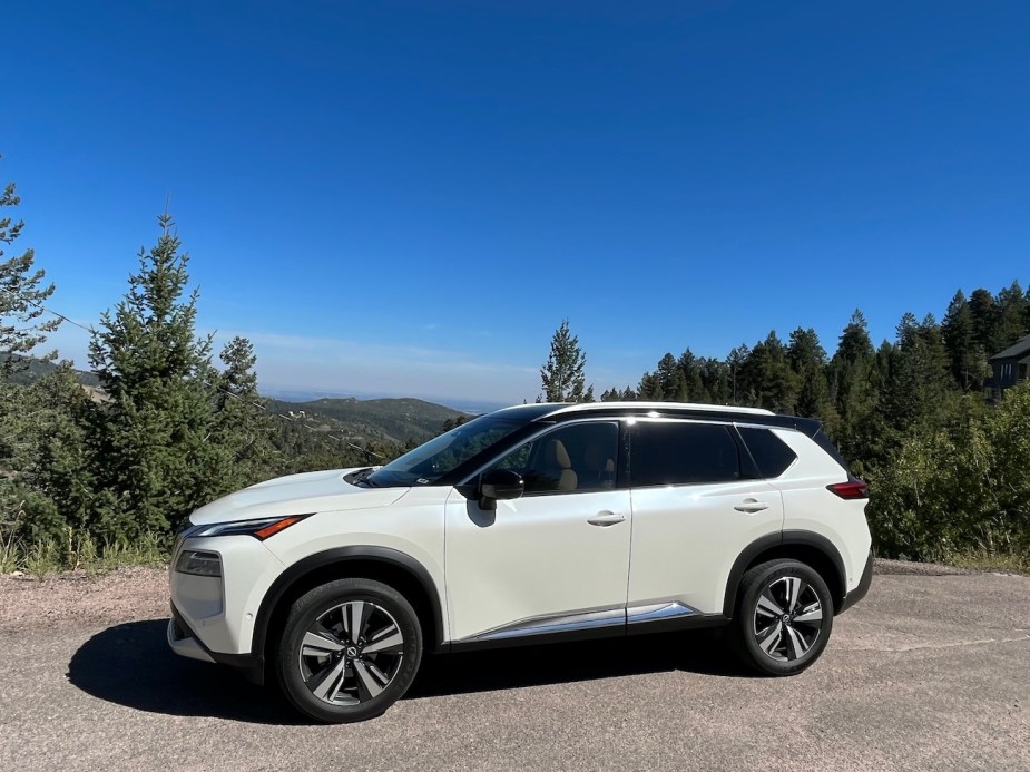 A side view of the 2022 Rogue near a mountain