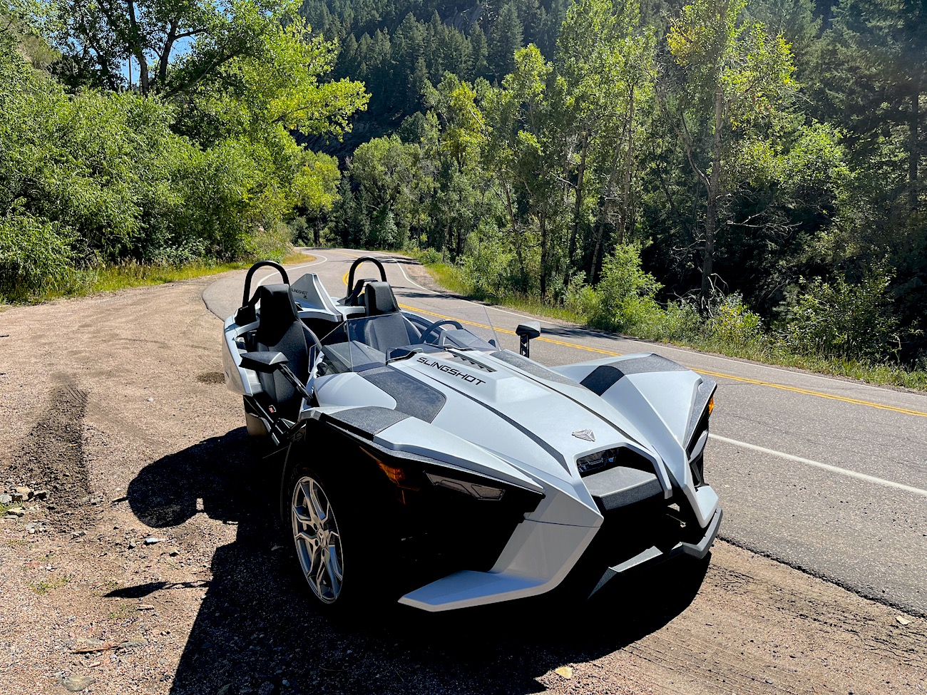 A front view of the Slingshot SL on a canyon road.