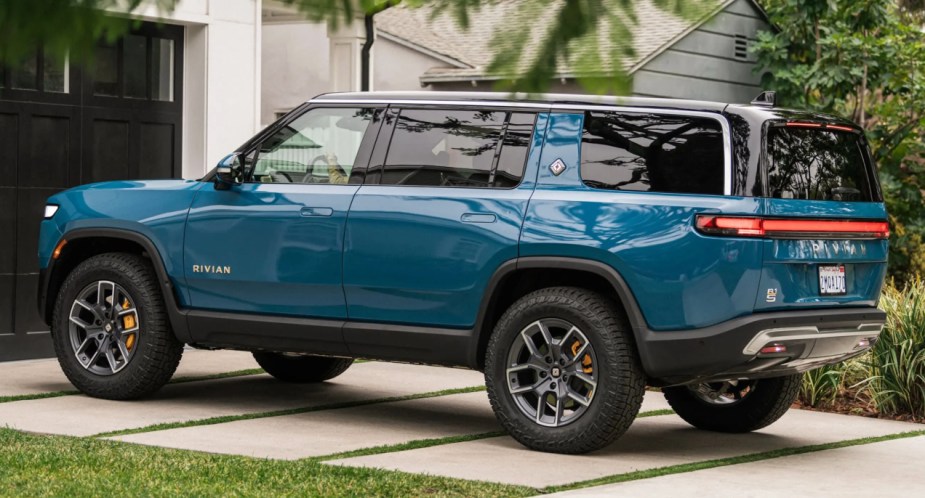 A blue 2022 Rivian R1S electric SUV.
