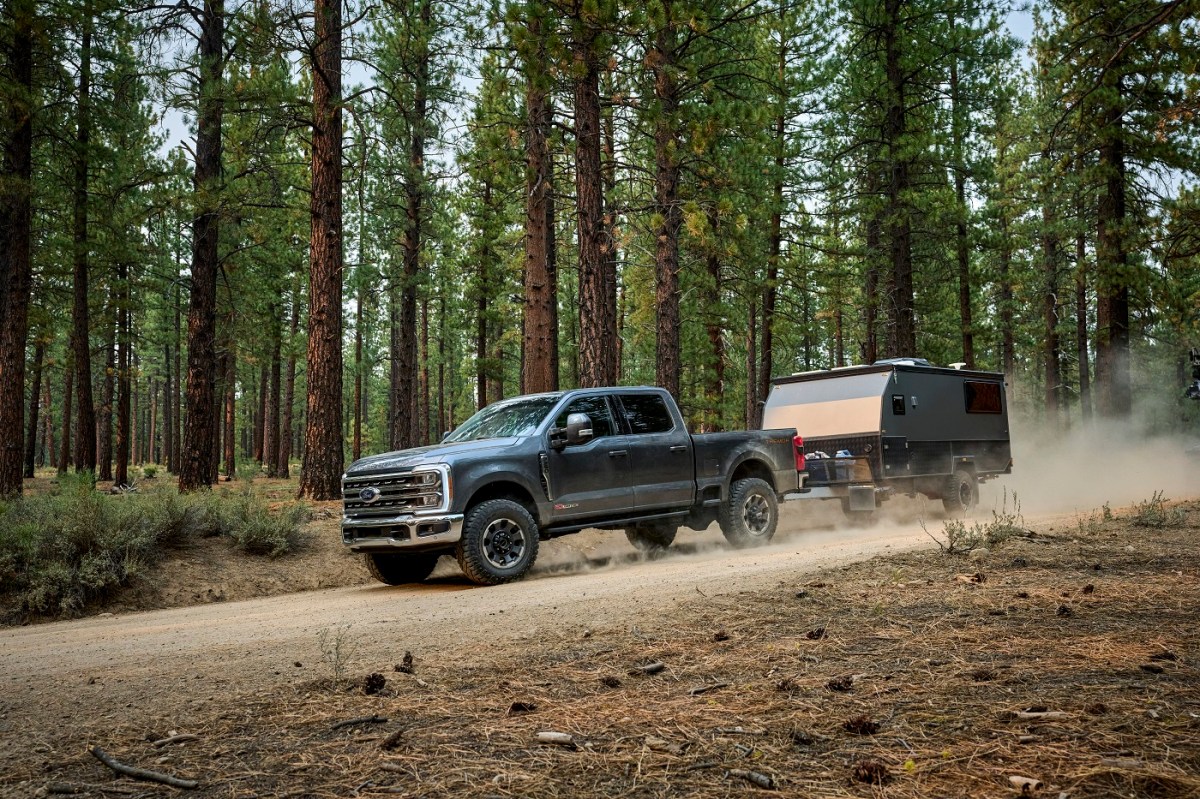 2023 Ford F-250 Tremor towing a small trailer. 