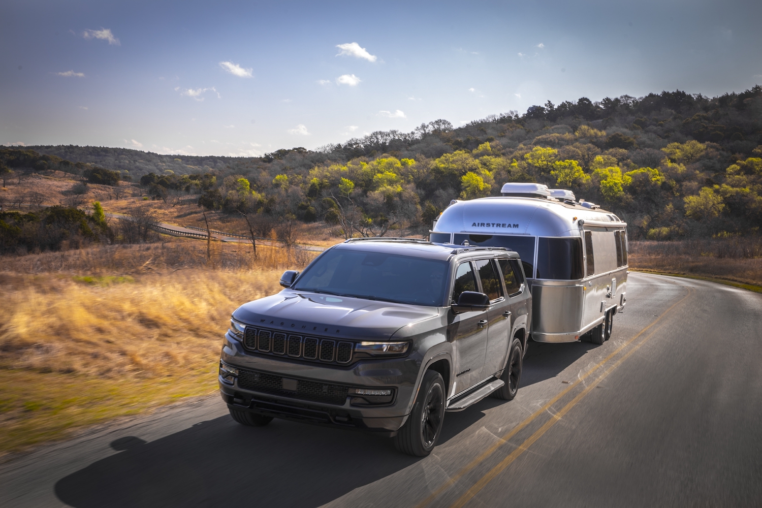 2023 Jeep Wagoneer L towing a camper