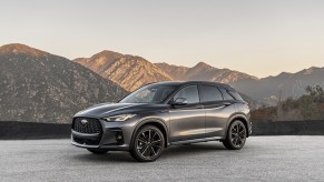 A graphite shadow 2023 Infiniti QX50 luxury crossover. It got a new Sport trim and a higher price.