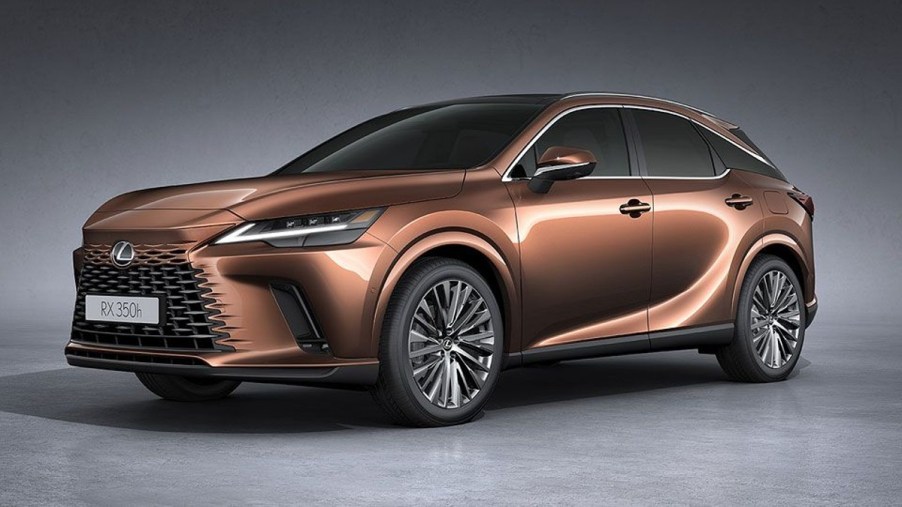 Gold Colored 2023 Lexus RX 350h luxury SUV posed