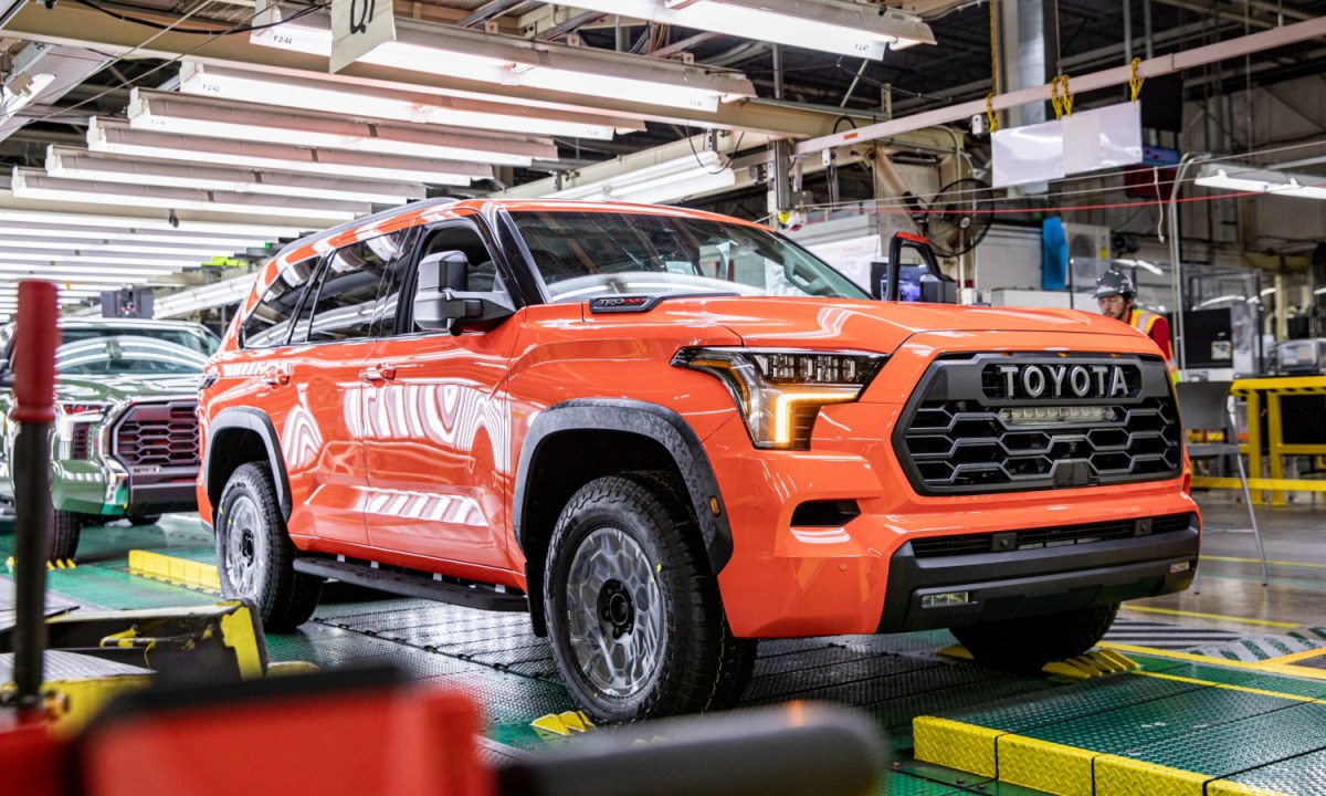 An orange Toyota Sequoia on the production line in Texas