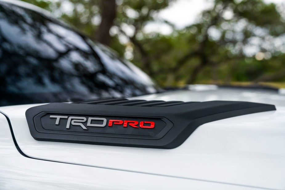 Detail shot of the TRD Pro badge on the hood of a 2023 Toyota Sequoia SUV.