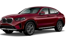 A red 2023 BMW X4 against a white background.