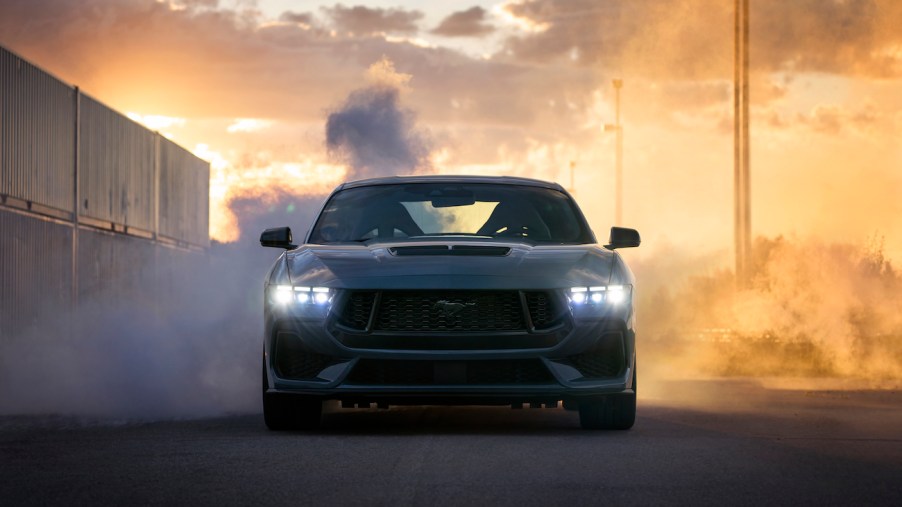 A 2024 Ford Mustang does a burnout.