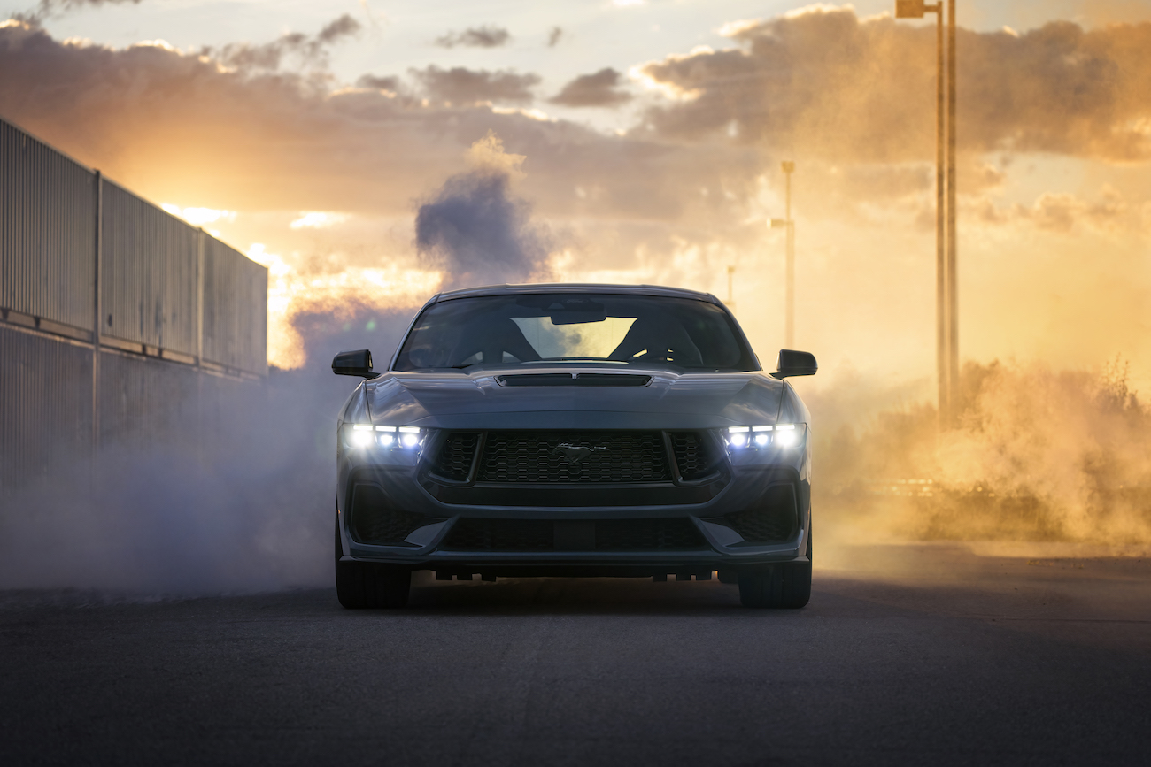 A 2024 Ford Mustang does a burnout.