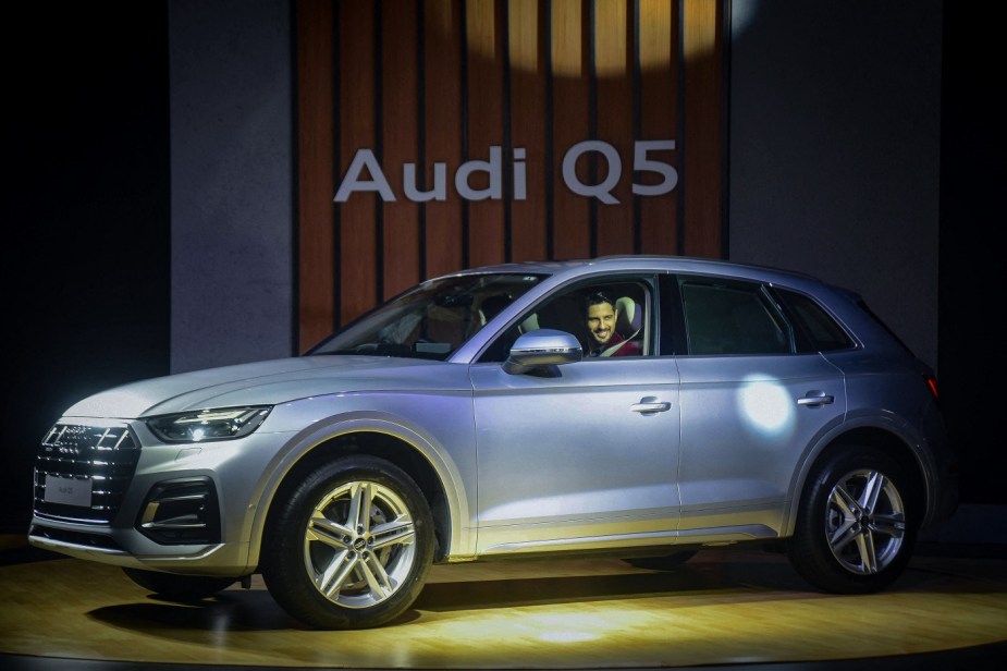 Audi Q5 in silver at an auto show. Only one Audi SUV earned a top safety pick plus award.