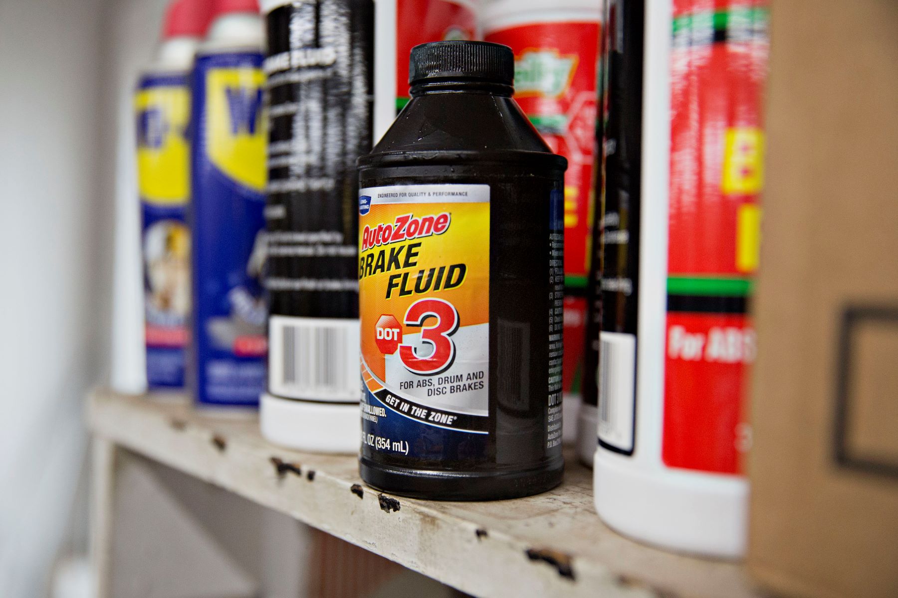 AutoZone brake fluid on a shelf in a store in Tiskilwa, Illinois