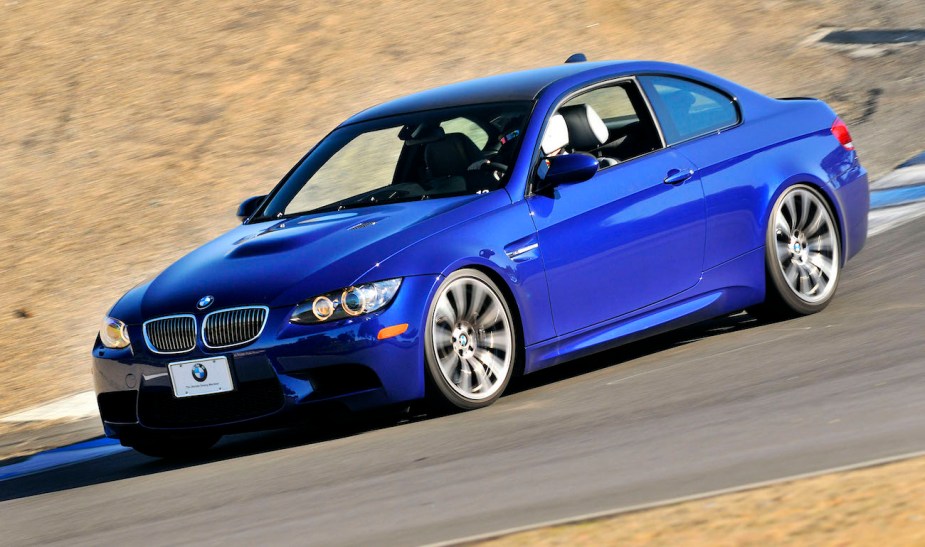 A 2008 BMW M3 drives on a track.