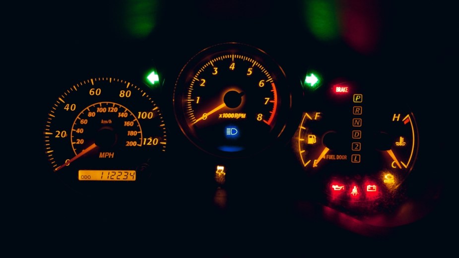 Car dashboard gauge instrument panel lighted up, highlighting what “C” and “H” mean 