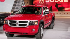 An old Dodge Dakota sits at an auto show. It could soon be updated as the 2024 Ram Dakota.