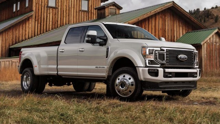 Ford Super Duty Pickup Truck in front of a barn