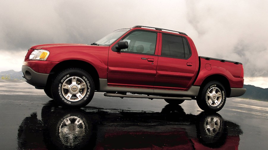 A red Ford Explorer Sport Trac shows off as a mid-size truck.