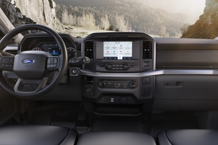 The interior of a Ford F-150 XL featuring a standard 8.0-inch touchscreen with SYNC4.