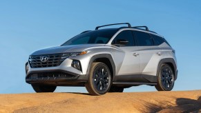 Front angle view of Shimmering Silver 2023 Hyundai Tucson crossover SUV