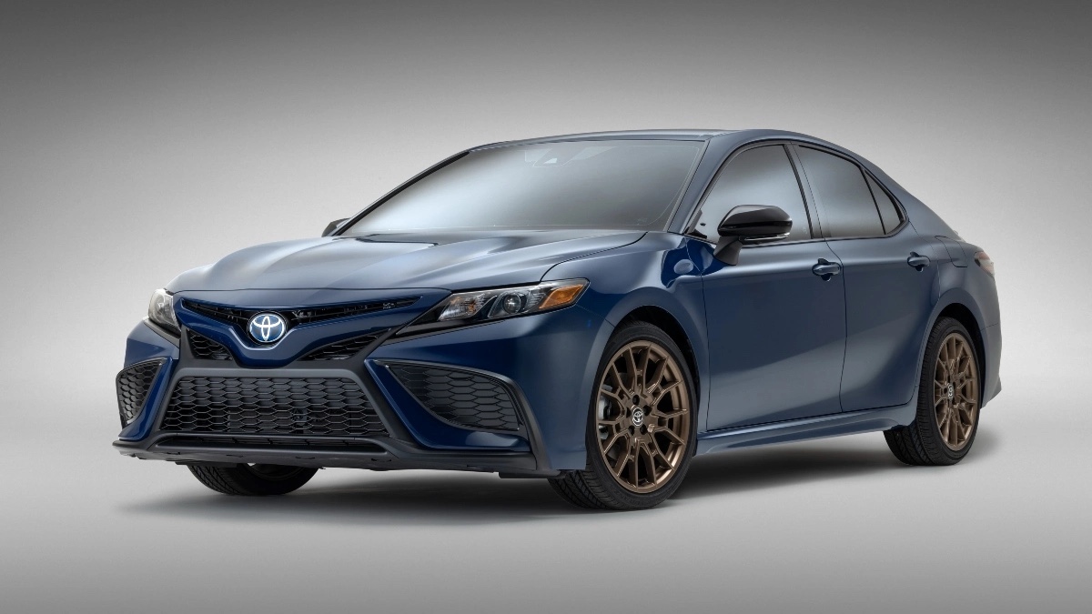 Front angle view of blue 2023 Toyota Camry midsize sedan, highlighting affordable alternatives costing under $27,000