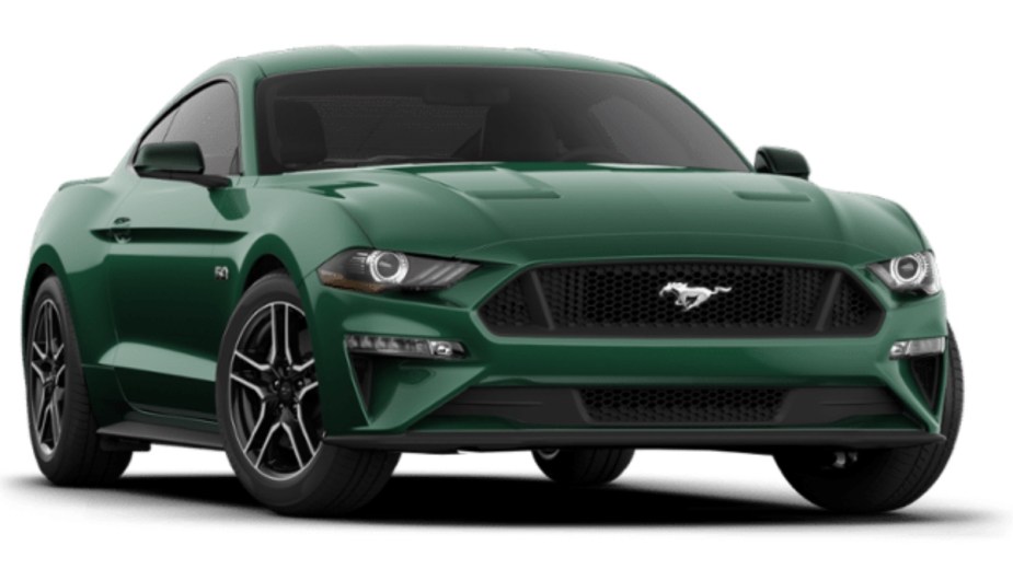 Front angle view of green 2022 Ford Mustang GT sports car, cheaper alternative to Chevy Corvette for less than $40,000