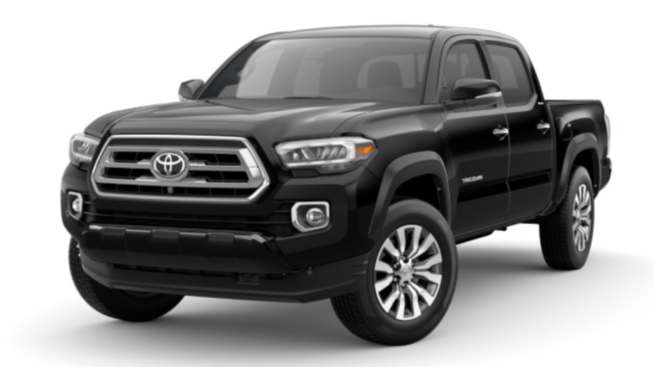 Front angle view of new 2023 Toyota Tacoma midsize pickup truck with Black exterior paint color