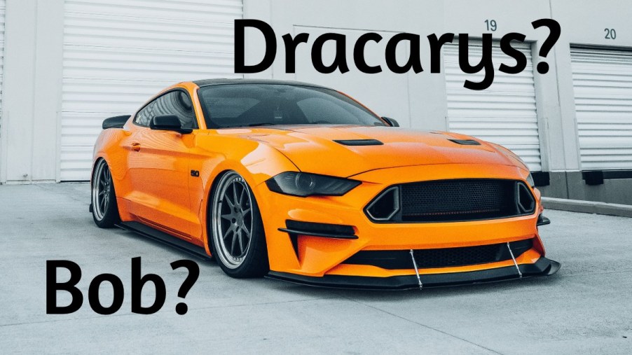 Front angle view of orange Ford Mustang with Dracarys and Bob nicknames, highlighting tips to choose good name for car