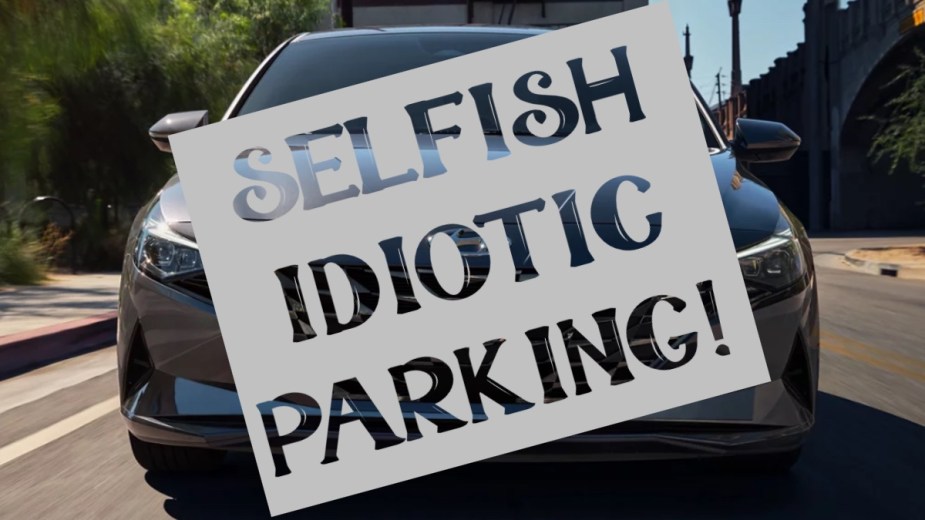 Gray Hyundai Elantra with "Selfish Idiotic Parking" sign similar to ones on car in Liverpool, England