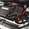 Looking at the engine and powertrain setup under the hood of a 2003 Honda Civic Hybrid
